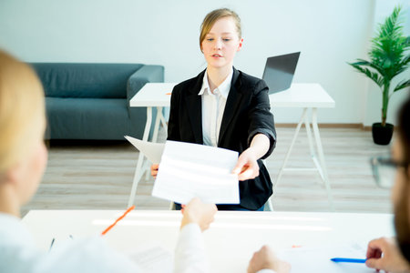 Candidate giving resumeの写真素材