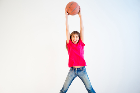 Girl playing basketballの写真素材