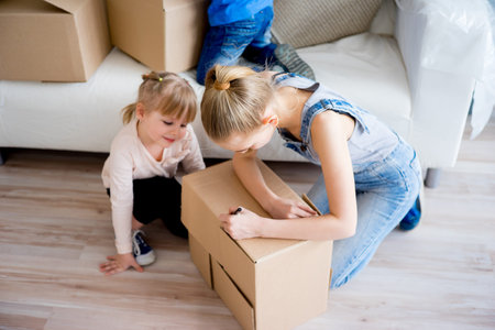 Family unpacking boxesの写真素材