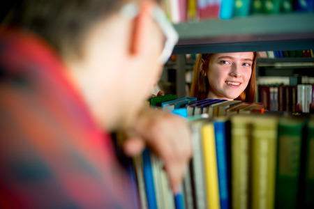 College students in libraryの写真素材