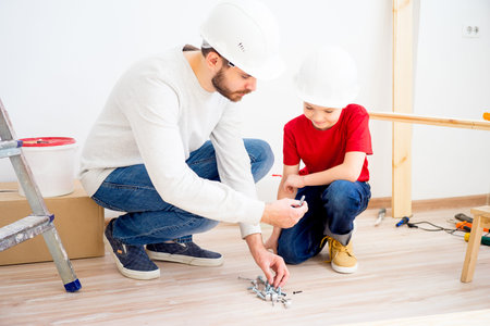 Father and son working together