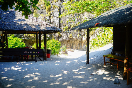 A resort hotel territory with palm treesの写真素材