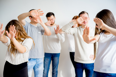 People hiding facesの写真素材