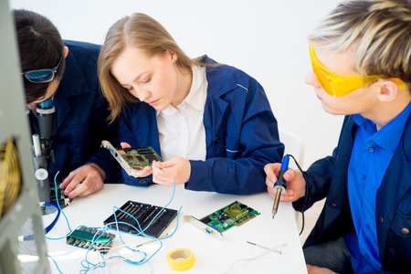 Technicians repairing computers