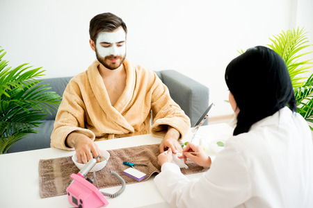 Man doing manicureの写真素材