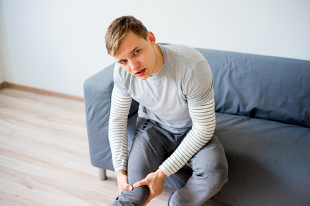 Man sprained his legの写真素材