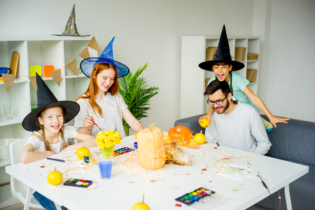 Family in halloween costumesの写真素材