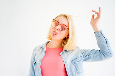 Stylish girl making facesの写真素材