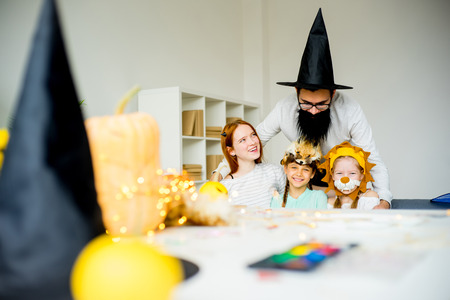 Family dressed in halloween costumesの写真素材