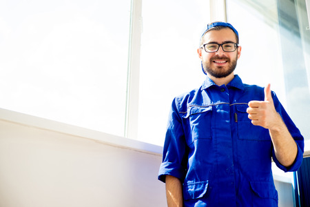 Construction worker thumbs upの写真素材
