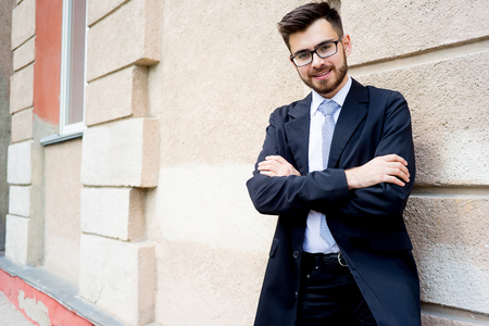 Successful businessman on a streetの写真素材