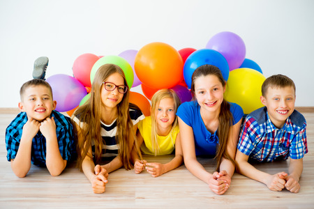 Happy children with balloonsの写真素材