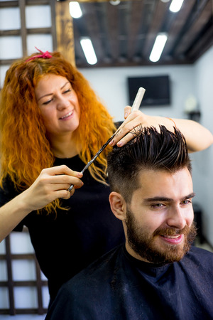 Barber with scissorsの写真素材