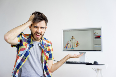 Retoucher is under stressの写真素材