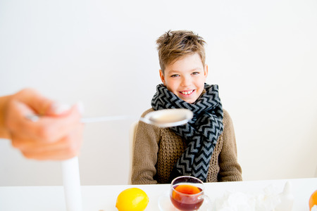 Boy having fluの写真素材