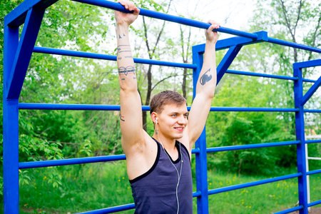 Guy working out outside