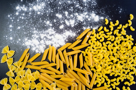 Various mix of italian pasta on a table
