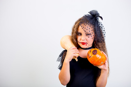 Girl in witch costumeの写真素材