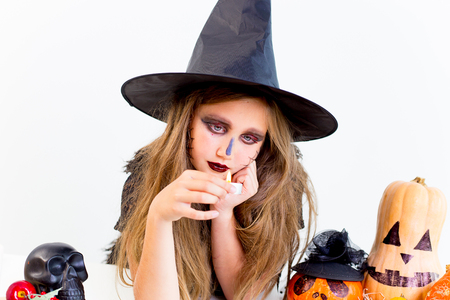 Girl in witch costumeの写真素材