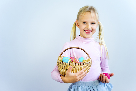 Girl with easter eggの写真素材