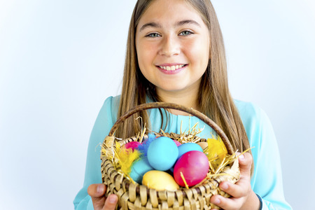 Girl with easter eggの写真素材
