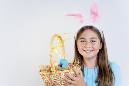 Girl with easter eggの写真素材