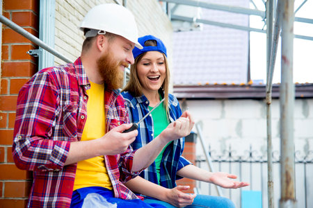 Couple building a house