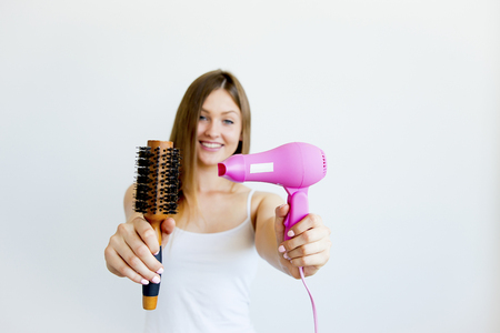 Girl taking care of her hairの写真素材