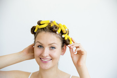 Girl taking care of her hairの写真素材
