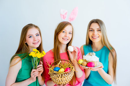 Three female friends celebrating easter