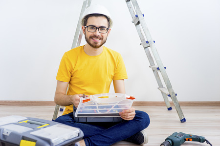 Guy with repair roolsの写真素材