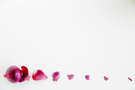 Creative layout of different fresh vegetables on a tableの写真素材