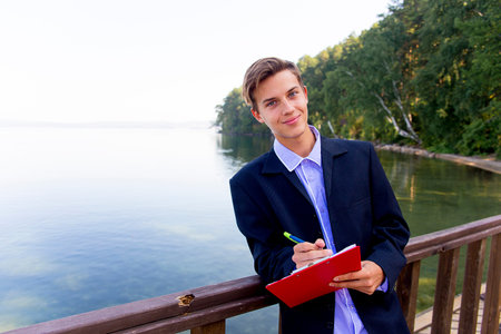 Businessman working on a beachの写真素材