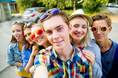 Teenagers walking outside