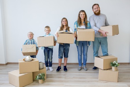 Family moving to a new houseの写真素材
