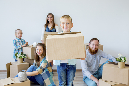 Family moving to a new houseの写真素材