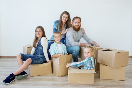 Family moving to a new houseの写真素材