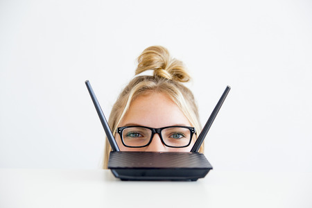 Girl working with wifiの写真素材