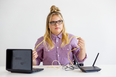 Girl fixing the routerの写真素材