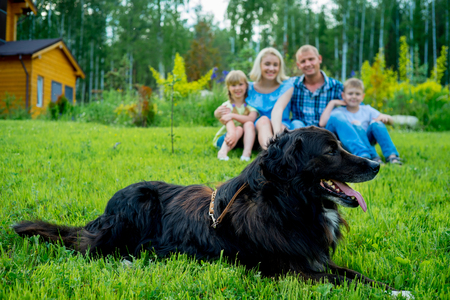 Family picnic with a dogの写真素材