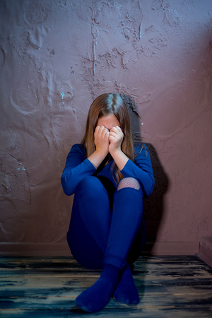 Kid is depressed because of child abuse and domestic violenceの写真素材