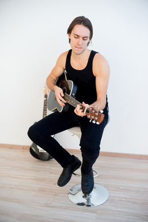 Man playing guitarの写真素材