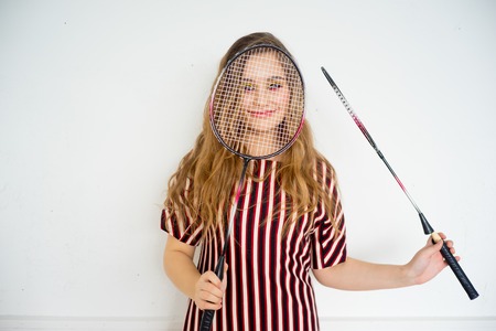 Girl with a badminton racketの写真素材