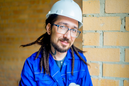 A portrait of a worker on a construction siteの写真素材