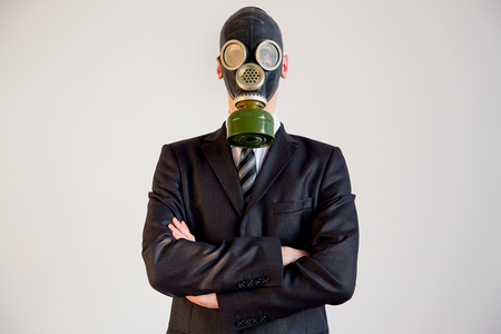 Businessman in a gas maskの写真素材