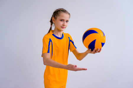 A portrait of a teen girl playing volleyballの写真素材