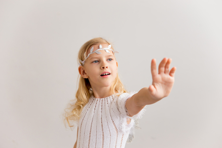 Girl in angel costumeの写真素材