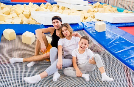 Family in trampoline centerの写真素材