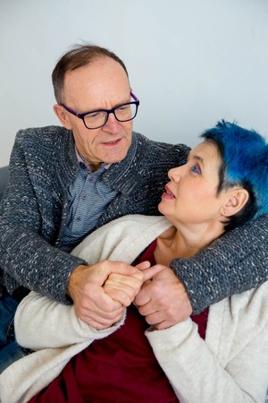 Senior couple cuddlingの写真素材