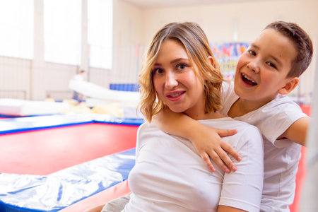 Family in trampoline centerの写真素材